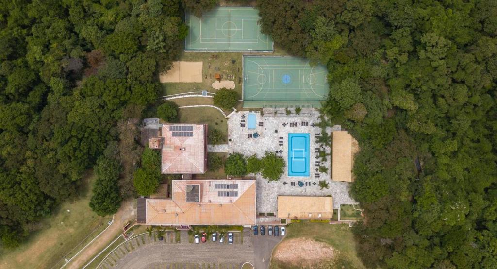 an aerial view of a house in the woods at Hotel Fazenda Brisa Itu in Itu
