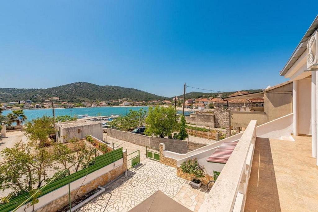 a balcony with a view of the water at Holiday Home Vala in Vinišće