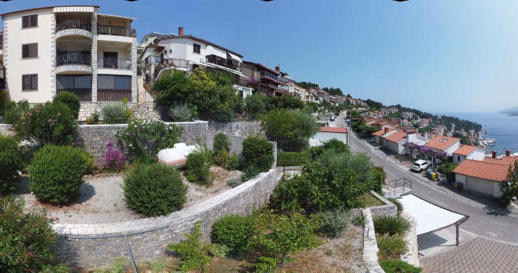 a view of a hill with houses and trees at Lady M in Rabac - Istrien in Rabac
