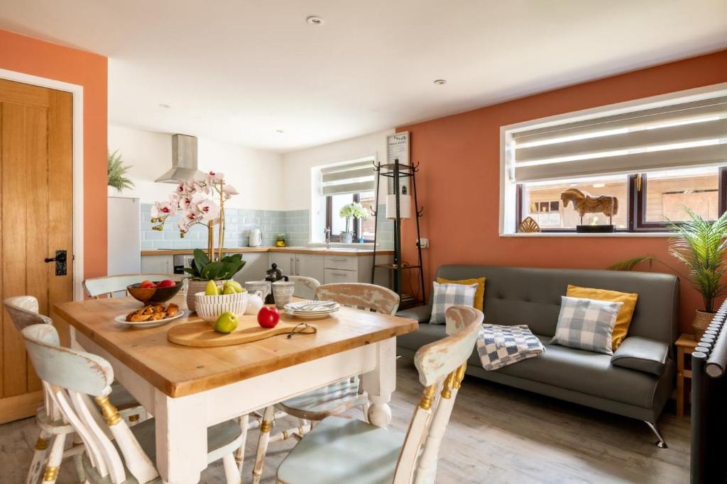 a kitchen and living room with a table and chairs at 2 Bed in Alkham oc-a34787 in Swingfield