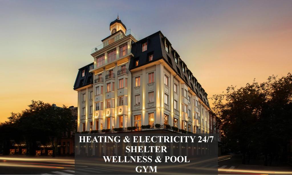 a building with a sign in front of it at Nadiya Palace & Wellness in Ivano-Frankivsk