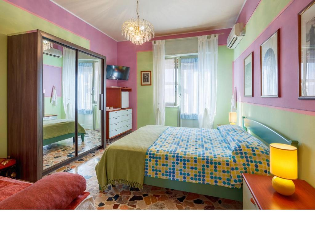 Postel nebo postele na pokoji v ubytování I Tetti Di Sassari B&B