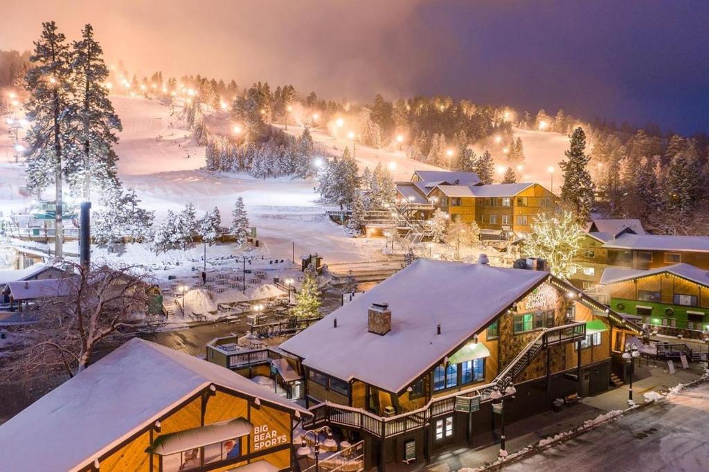 a ski resort with snow on the slopes at night at Spa Steps to Lift Private Spa BBQ Massage Chair in Big Bear Lake