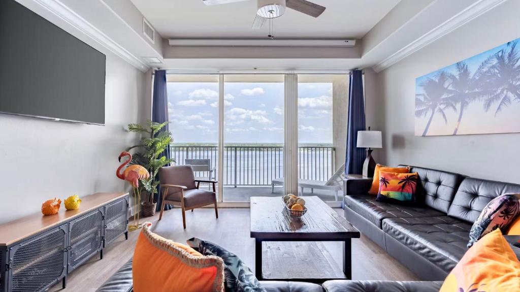 a living room with a couch and a table at Blue Heron Resort in Orlando