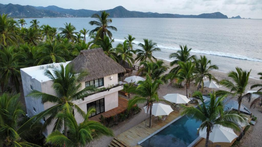 an aerial view of a resort and the ocean at Aldea Cayaco Villa A1 in La Manzanilla