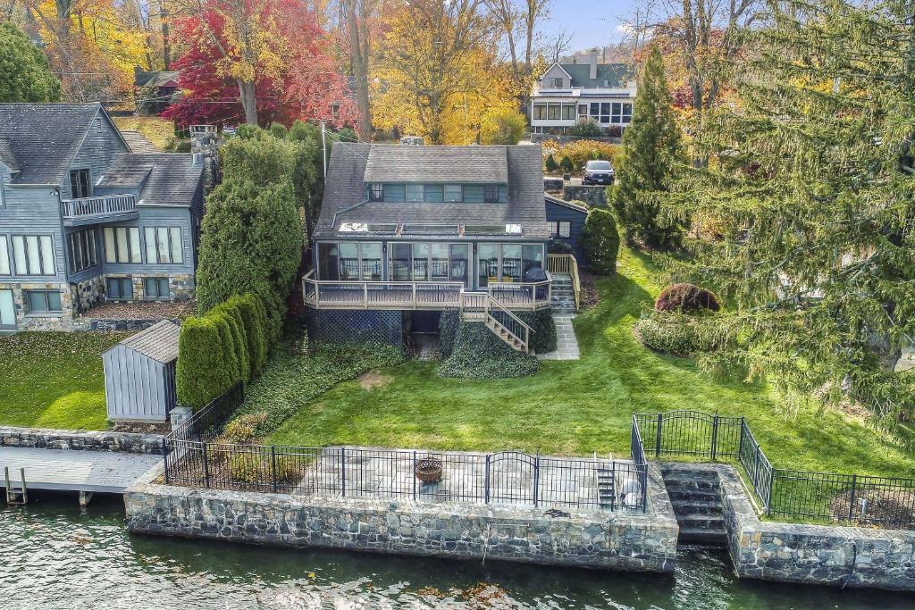 an aerial view of a house on the water at Candlewood Isle in New Fairfield