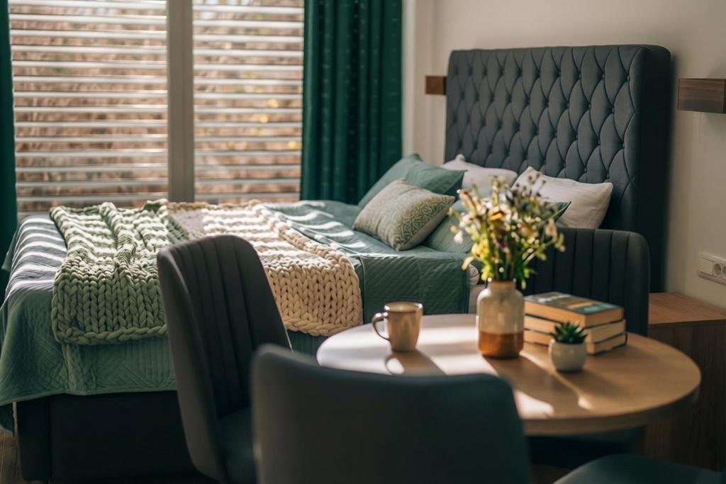 a living room with a bed and a coffee table at White Blue Ohrid - Free Parking Balcony near Lake and Old Town Apartments in Ohrid