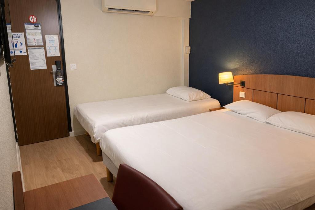 Kyriad Montargis Amilly - Dreibettzimmer (1 Doppelbett + 1 Einzelbett)