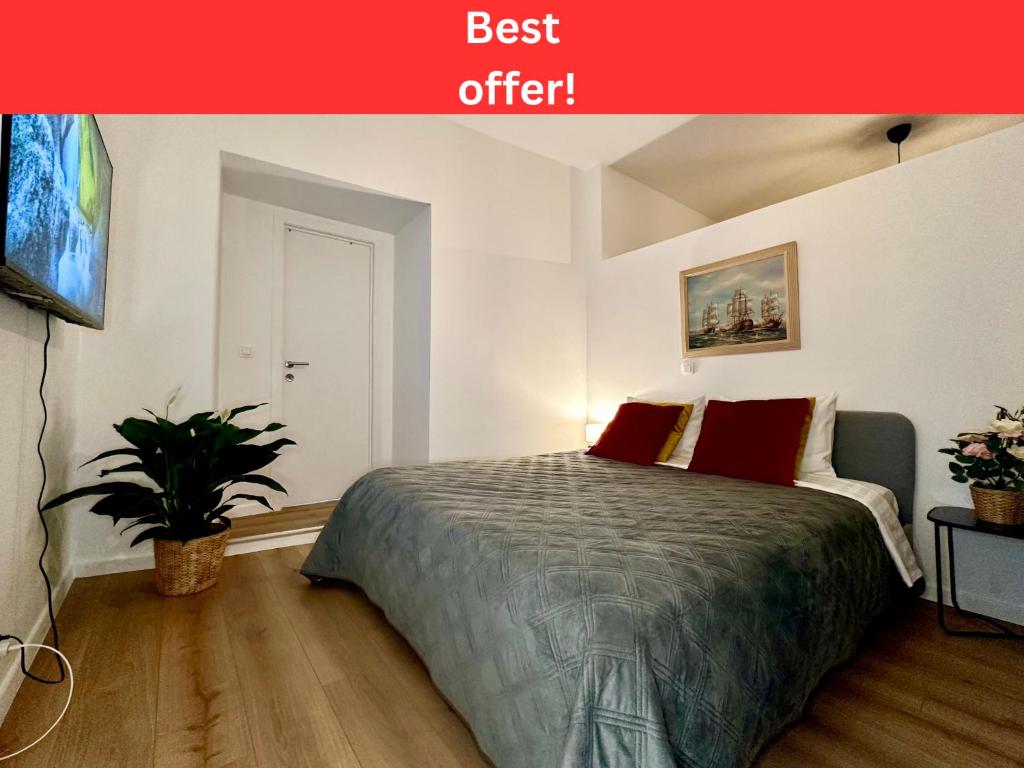 a bedroom with a bed in a room at Luxury Suites Mons by Rikas Hotels in Mons