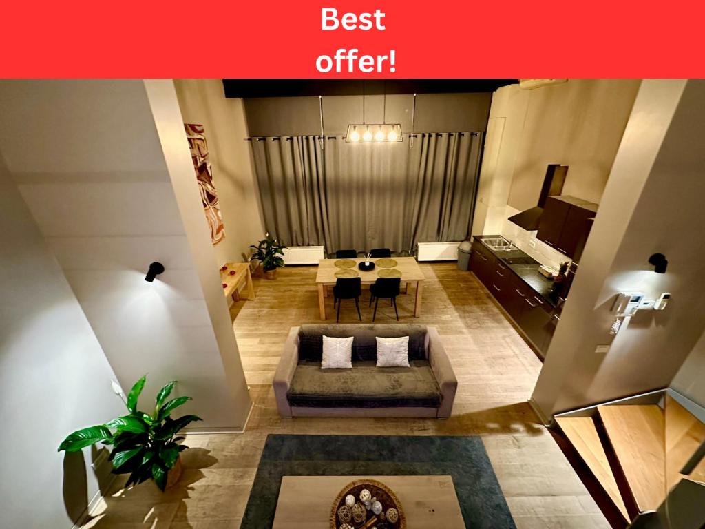 an overhead view of a living room with a couch at Luxury Suites Castel by Rikas Hotels in Antwerp