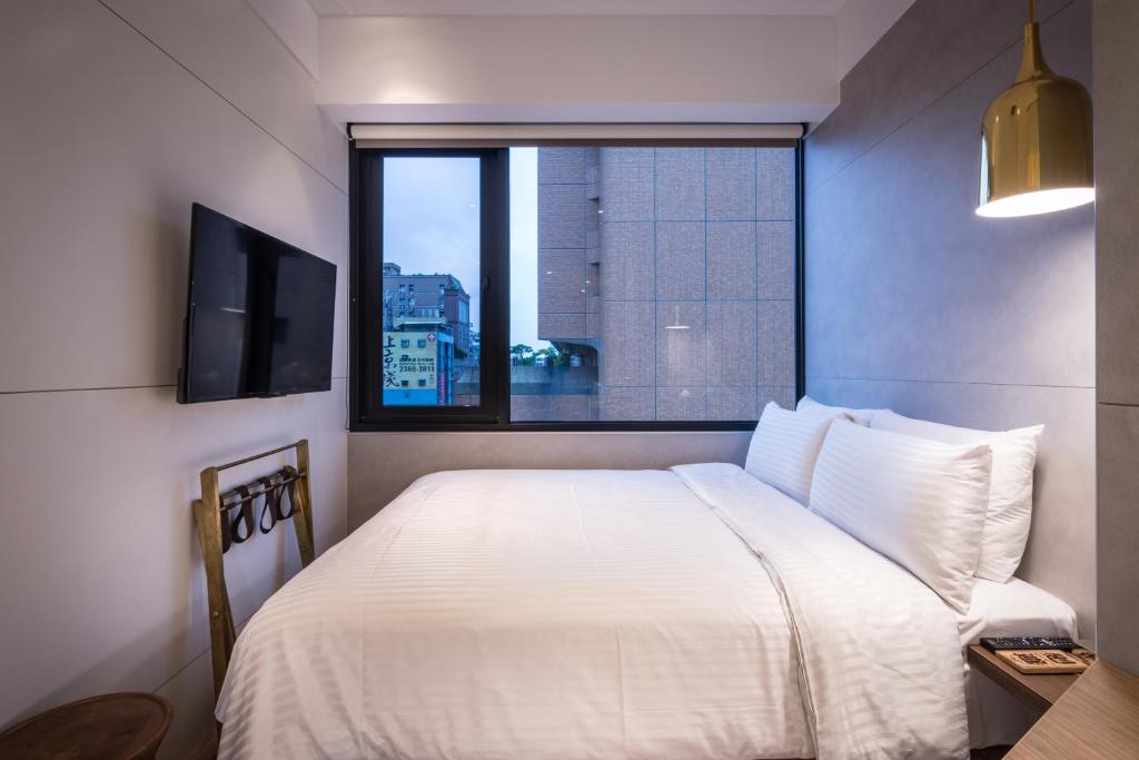 Postel nebo postele na pokoji v ubytování Hotel Relax 5