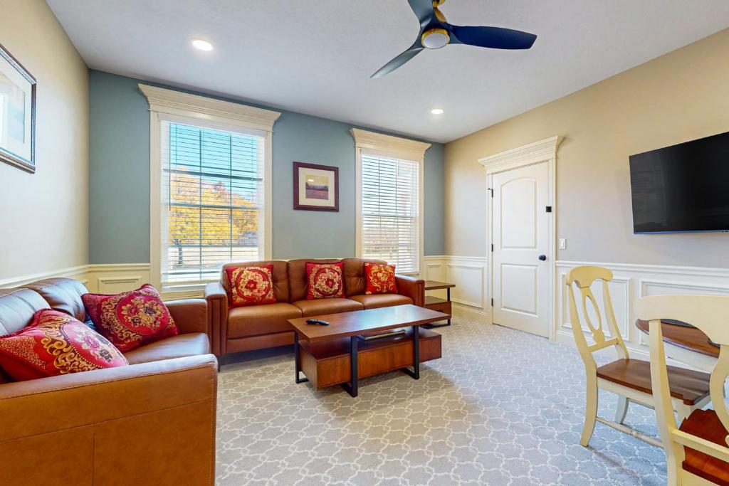a living room with a couch and a table at Work, Play & Stay! Apt Near Holyoke Medical Center in Holyoke