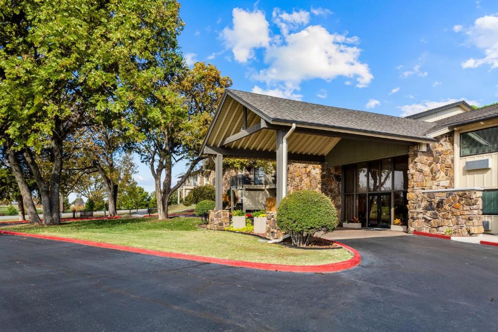 a home with a driveway in front of a building at WorldMark Grand Lake in Monkey Island