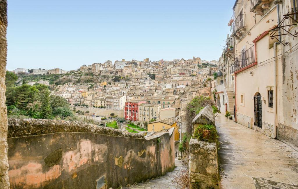 a view of a city from an alleyway at Casa Giulia 8 in Ragusa