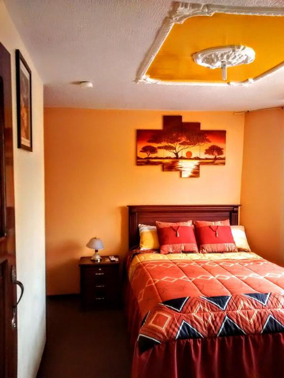 Postel nebo postele na pokoji v ubytování Hotel Residencial El Viajero