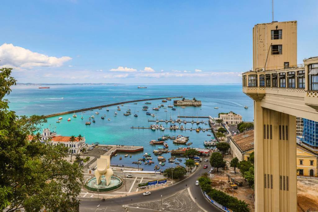 a view of a harbor with boats in the water at Marlon Franca in Salvador