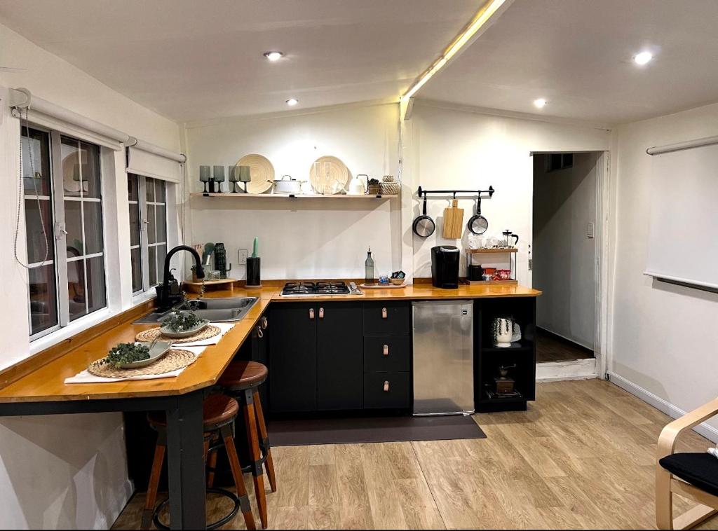 a kitchen with a sink and a counter top at Casita Garden n chill in Tijuana