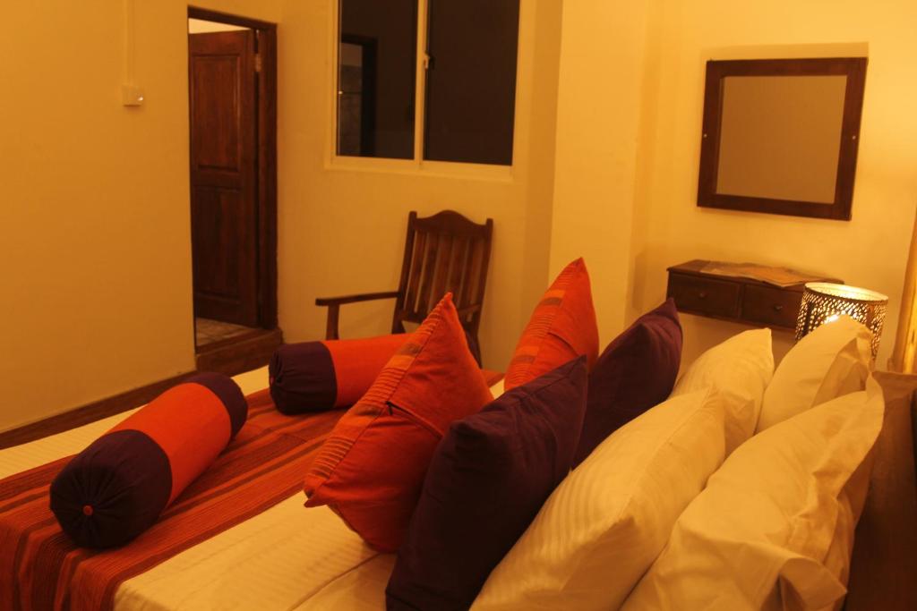 Postel nebo postele na pokoji v ubytování Dumbara Peak Residence