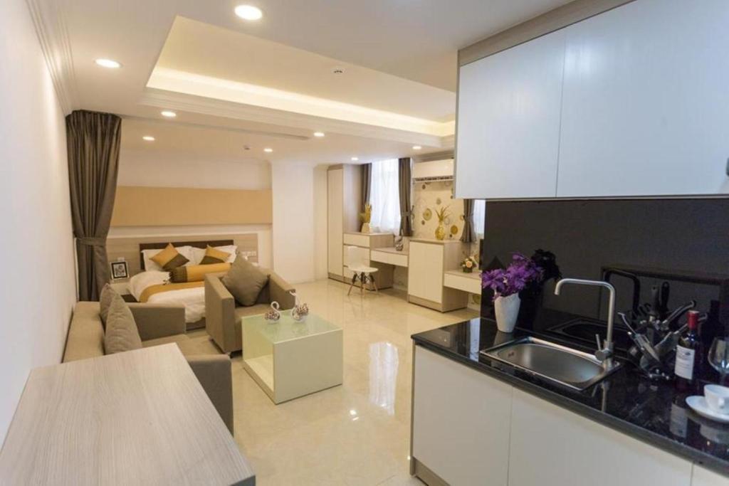 Kuchyň nebo kuchyňský kout v ubytování CA&SA Serviced Apartment