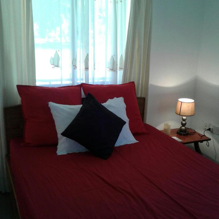 Postel nebo postele na pokoji v ubytování Agnes Cottage - Emerald