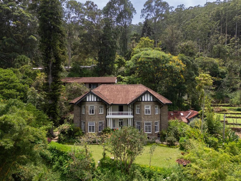 an aerial view of a house in the woods at Graystone Bungalow by Seven Angels in Haputale