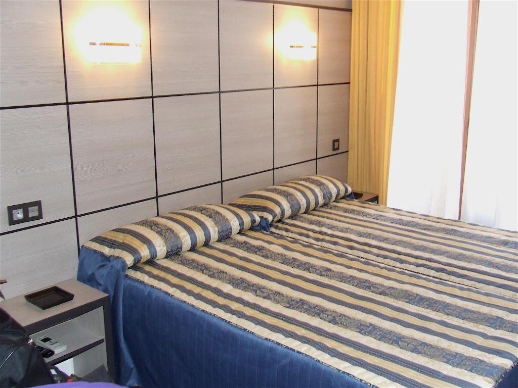Posteľ alebo postele v izbe v ubytovaní Hostal Larios