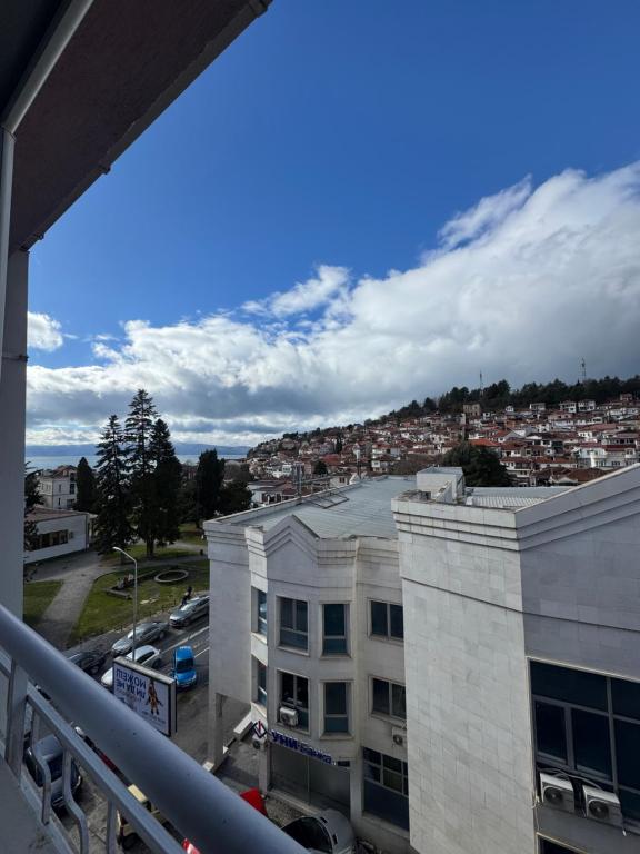 a view of a city from a balcony of a building at Apartman Harmony in Ohrid