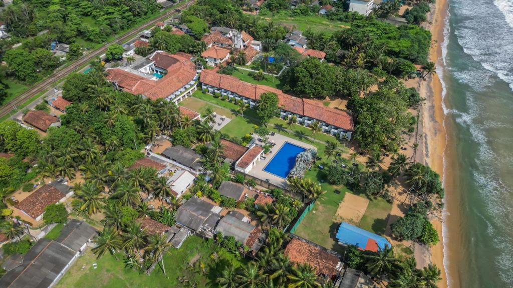 Hibiscus Beach Hotel & Villas - Housity