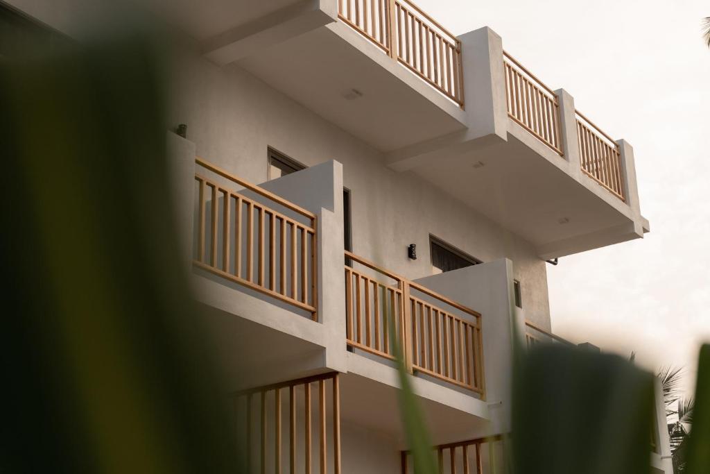 a building with balconies on the side of it at Orca Dickwella in Dickwella