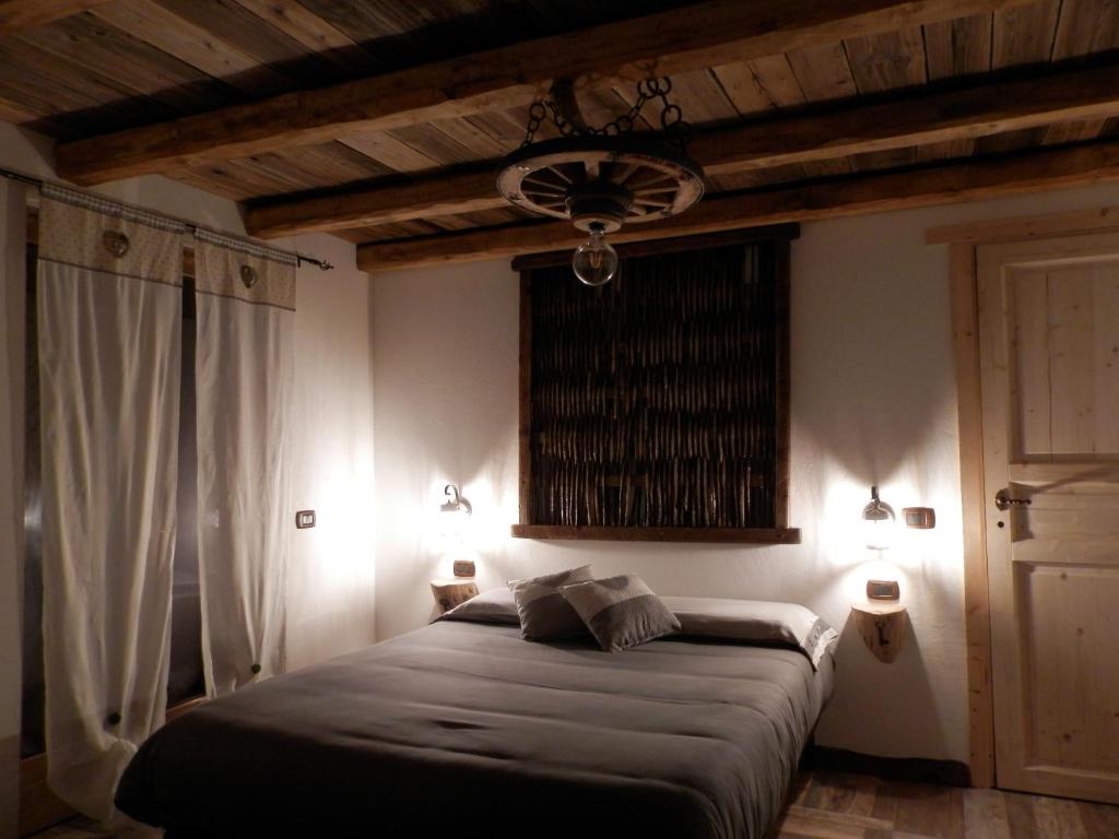 Postel nebo postele na pokoji v ubytování B&B Le Ciaf