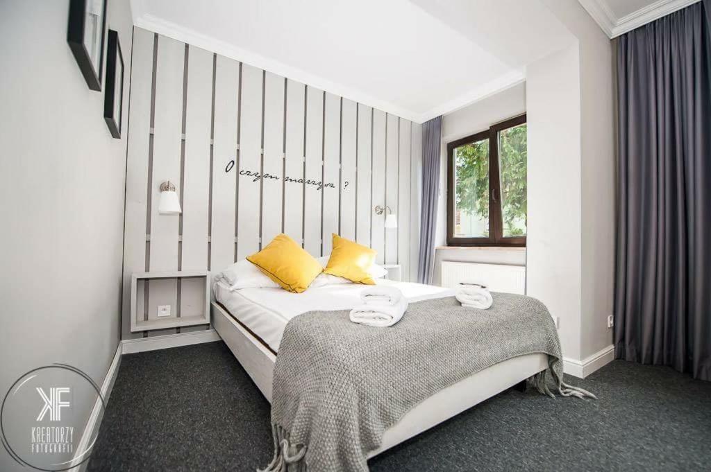 Posteľ alebo postele v izbe v ubytovaní Hotel Otomin