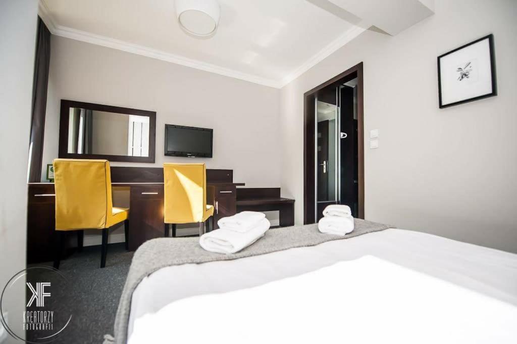Posteľ alebo postele v izbe v ubytovaní Hotel Otomin