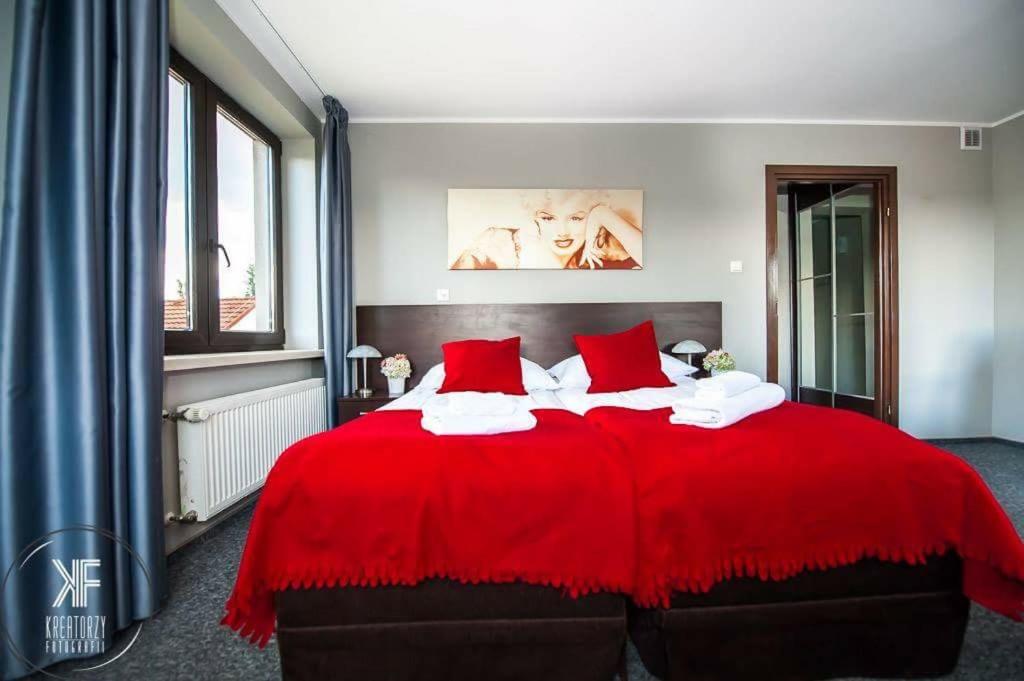 Posteľ alebo postele v izbe v ubytovaní Hotel Otomin