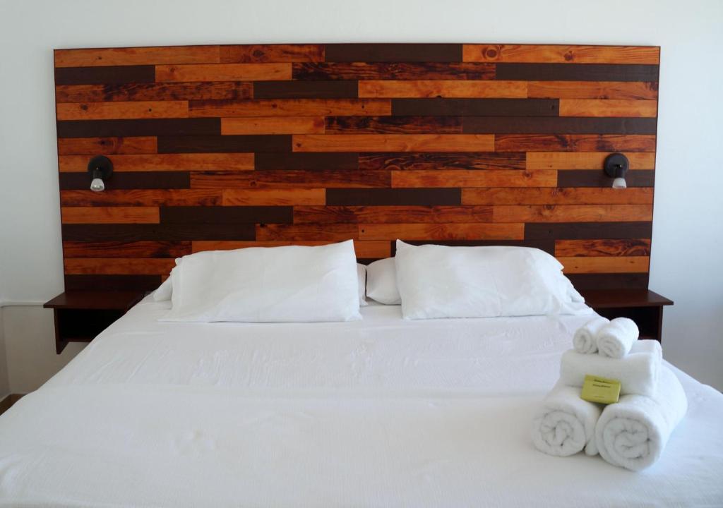 Postel nebo postele na pokoji v ubytování Bravo Beach Hotel