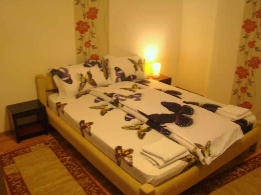 Letto o letti in una camera di Guest House Andrei