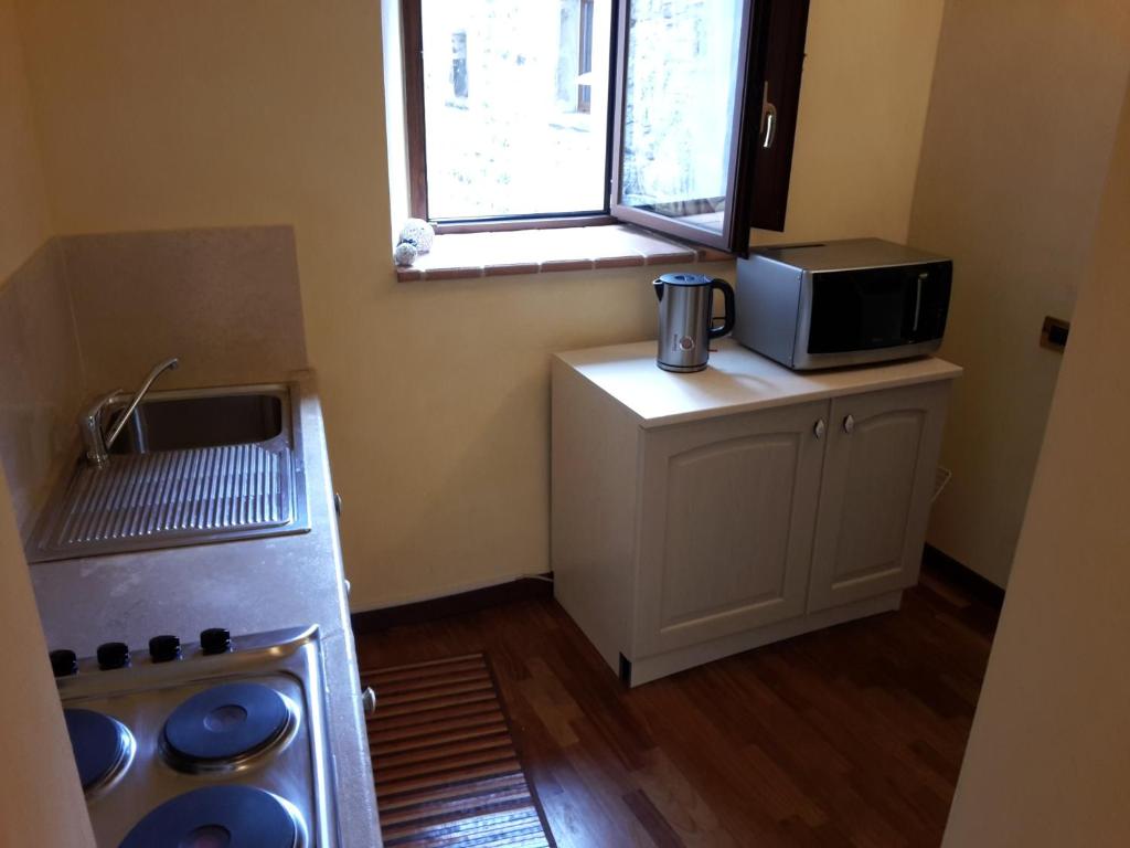 Kuchnia lub aneks kuchenny w obiekcie Castello Izzalini Todi Resort