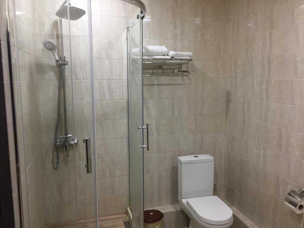 Koupelna v ubytování Primer Hotel