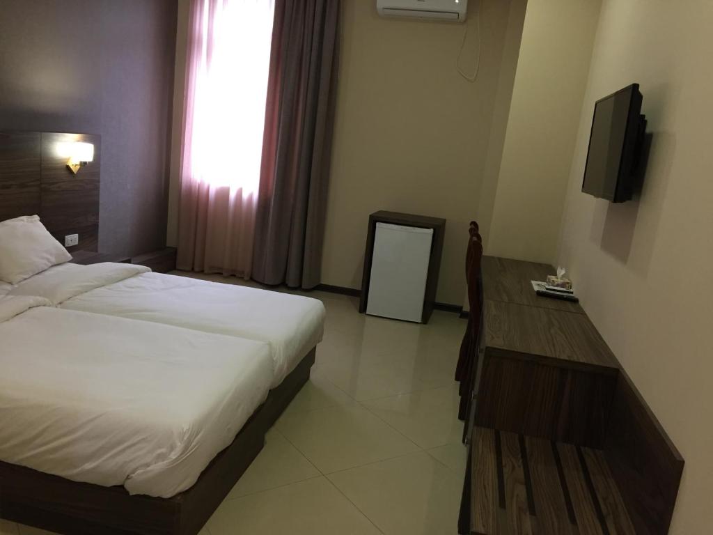 TV a/nebo společenská místnost v ubytování Primer Hotel