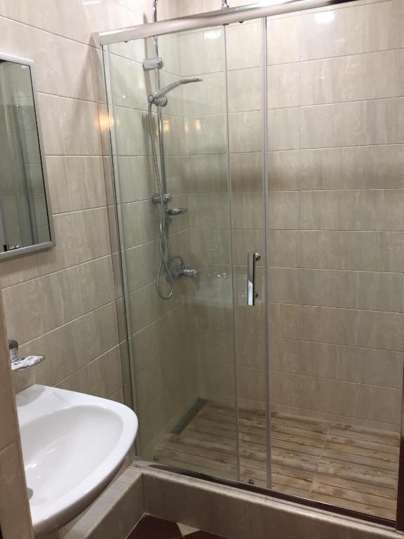 Koupelna v ubytování Primer Hotel