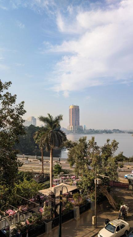 a view of a city with a large body of water at Nilotique in Cairo