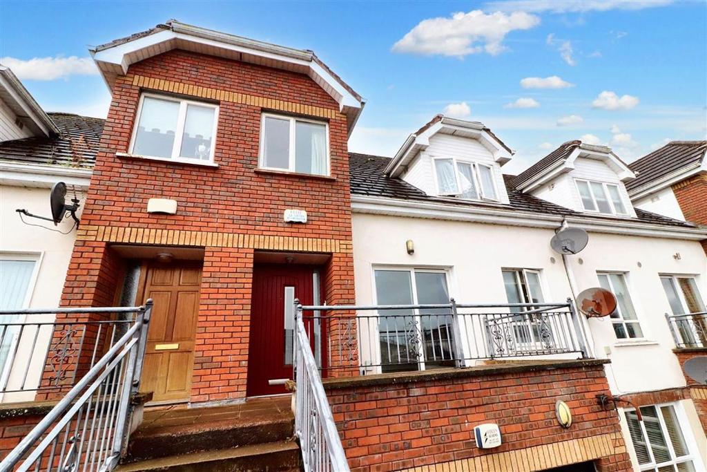 a brick house with a staircase in front of it at Large 3 bed Duplex Apartment - Rhebogue Limerick in Limerick