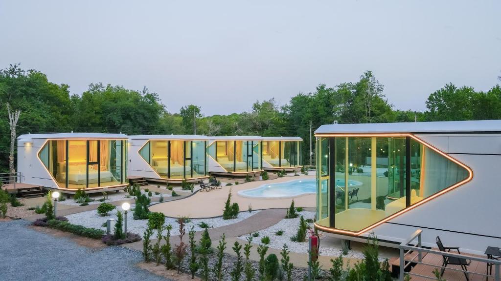 a rendering of a house with a swimming pool at Aqua Soul de Pakbara in Ban Pak Ba Ra