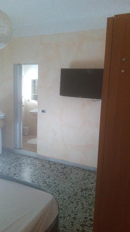 Televízia a/alebo spoločenská miestnosť v ubytovaní Bed And Breakfast Il Subacqueo