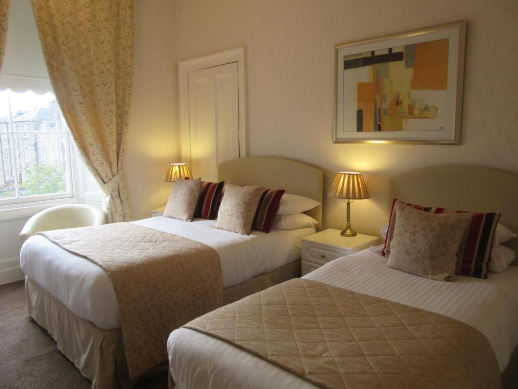Postel nebo postele na pokoji v ubytování Sonas Guesthouse