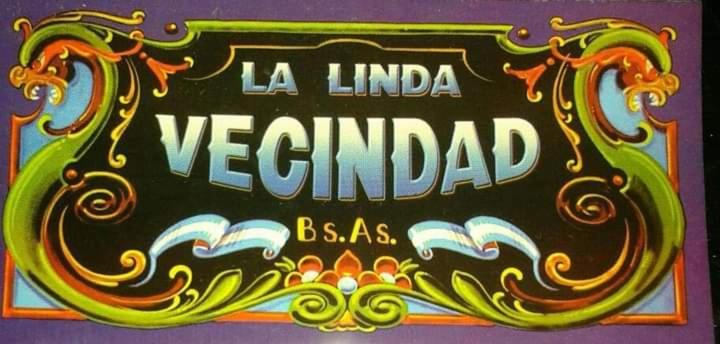 a sign for a verdana seafood restaurant at La Nueva Vecindad in San Bernardo
