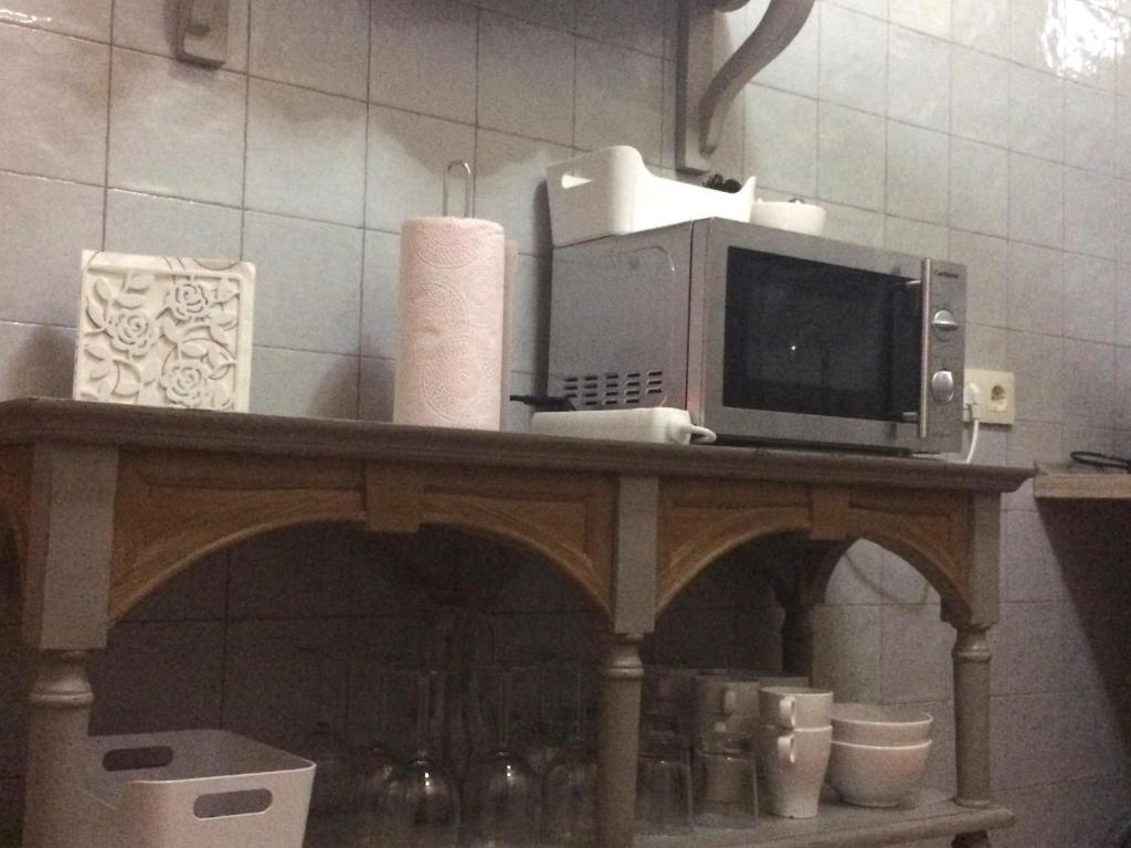 Kuchyň nebo kuchyňský kout v ubytování Apartamentos Coliseo