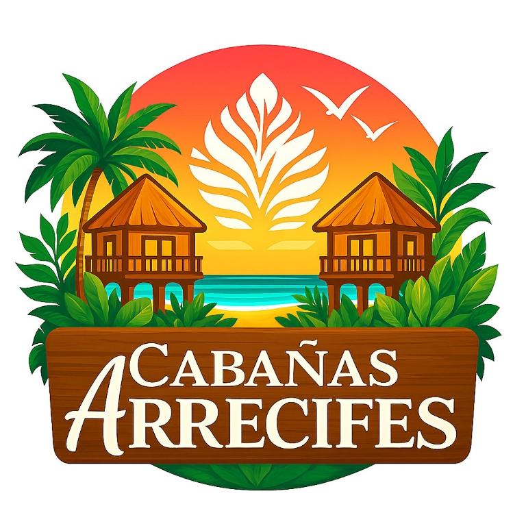 a sign with cabanas tropics and a resort at Cabañas Arrecifes in El Valle