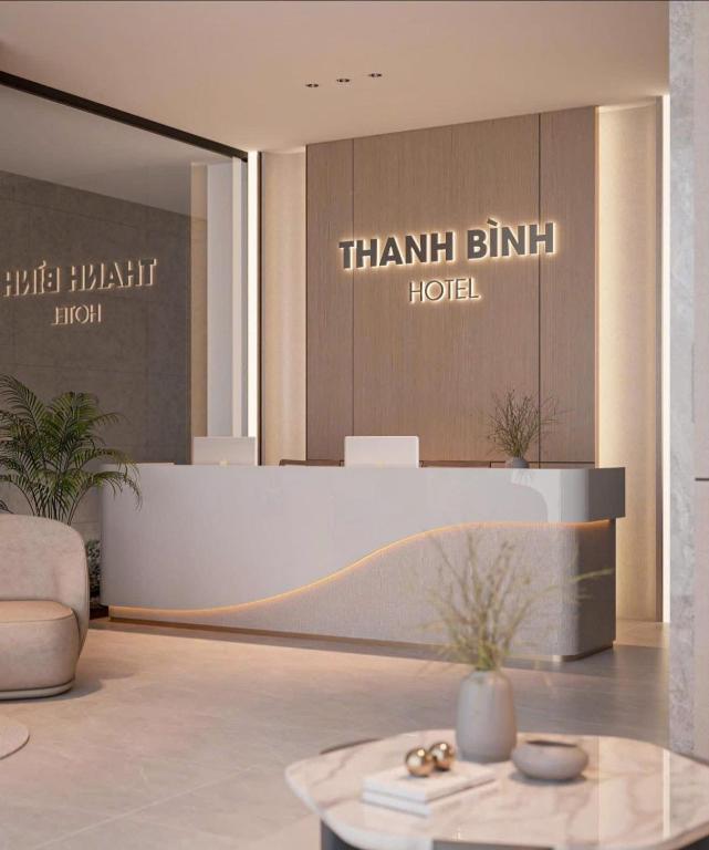 a lobby of a hotel with a reception desk at Thanh Bình Hotel - Buôn Ma Thuột in Buon Ma Thuot