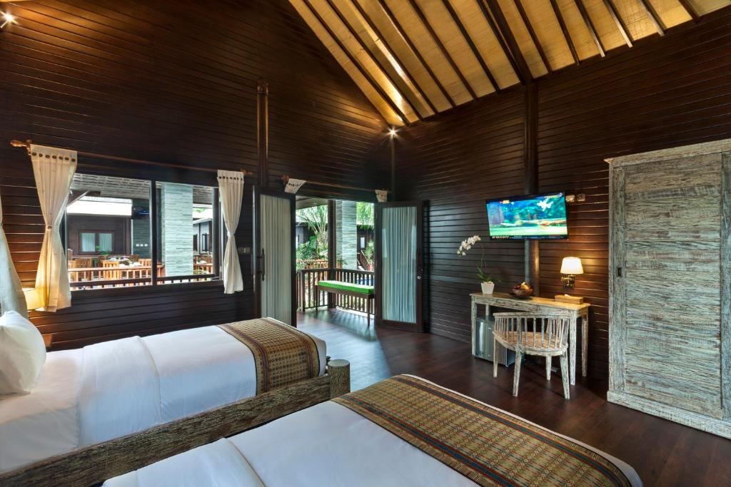 Coconut Boutique Resort - Houten Bungalowsuite