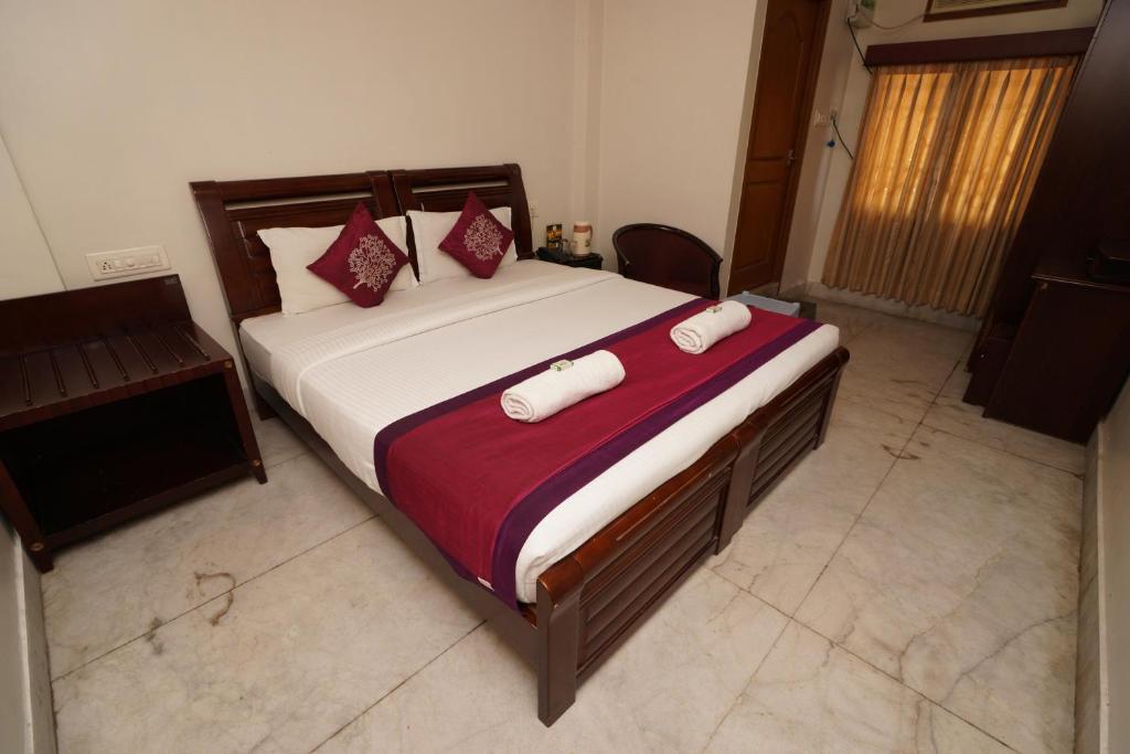 Postel nebo postele na pokoji v ubytování Lloyds Serviced Apartments, Near Music Academy